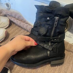 2 pairs of low boots & high boots size 7. The low boot is Carlos Santana brand.